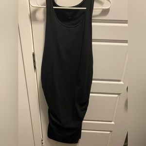 Tight fitting maternity dress. Very flattering.